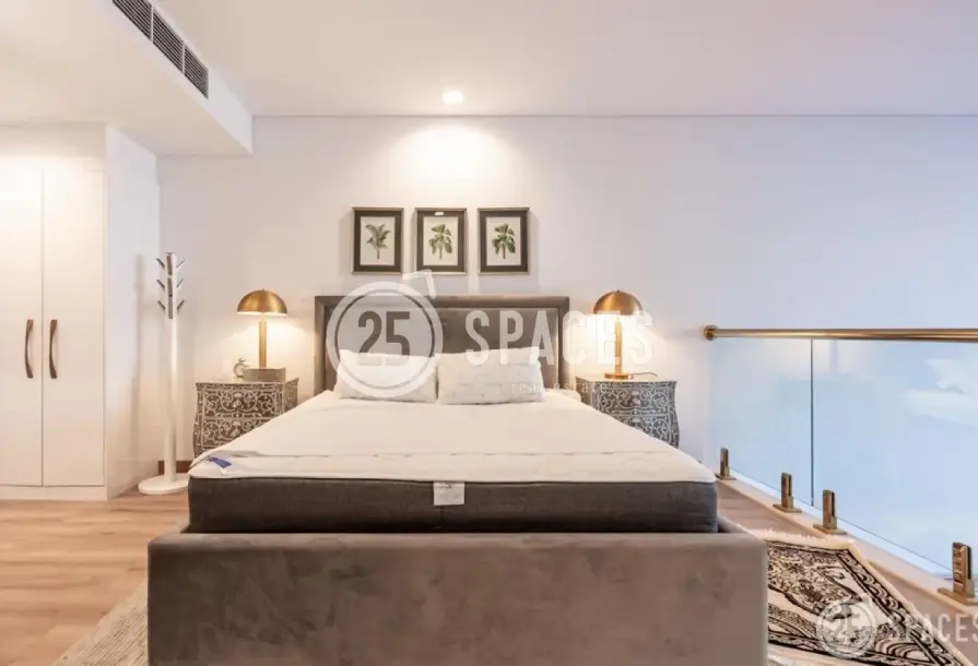One-Bedroom Loft | Balcony with Garden View-6